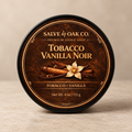 Tobacco Vanilla Noir premium shave soap by Salve & Oak Co. in a black tub with tobacco and vanilla label artwork