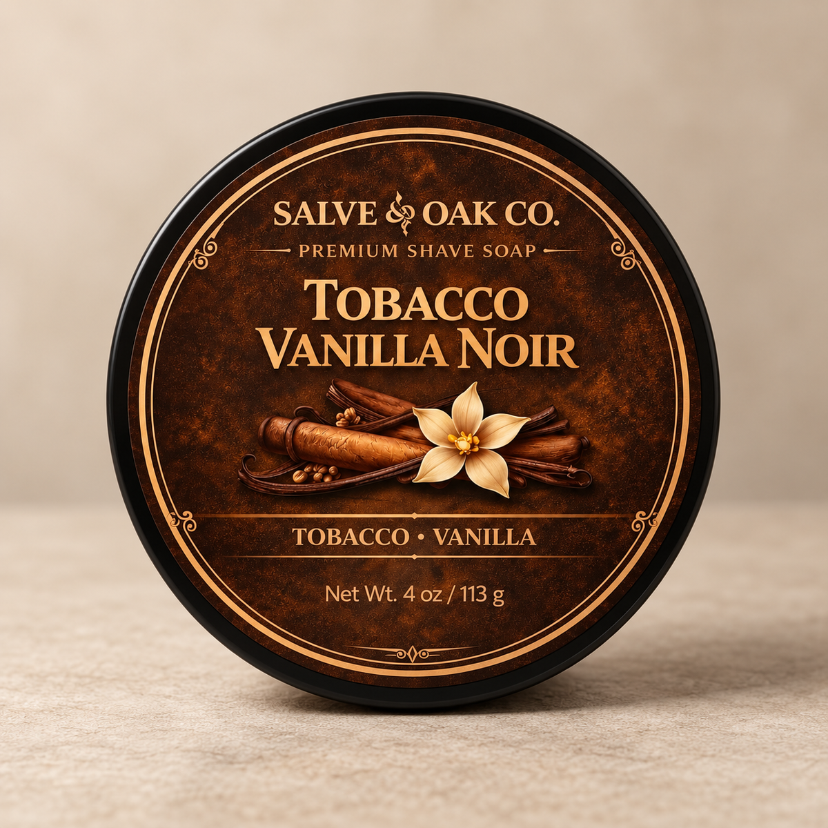 Tobacco Vanilla Noir premium shave soap by Salve & Oak Co. in a black tub with tobacco and vanilla label artwork